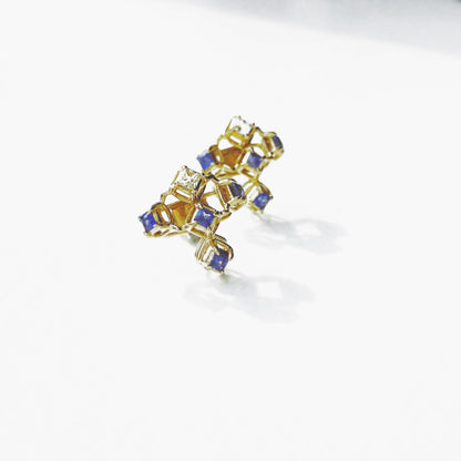 A pair of 14 karat yellow gold earrings with Blue and White Sapphires. This picture is only the detachachable top part. It consists of five square cut, top is white and the others are blue sapphires. They are standing like stargazing from the ground. 