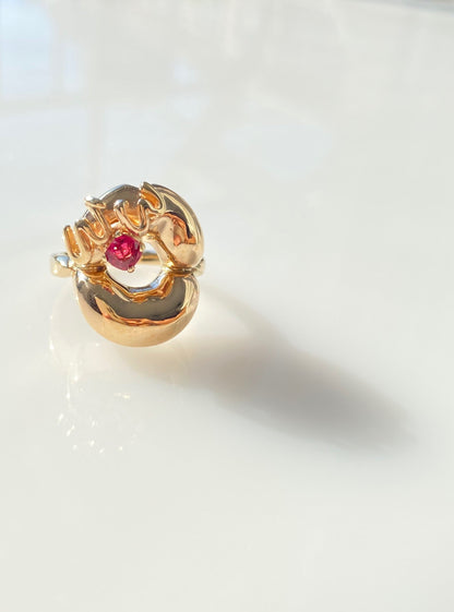 14 karat yellow gold ring with WOW letters with prongs setting cushion cut pink spinel.